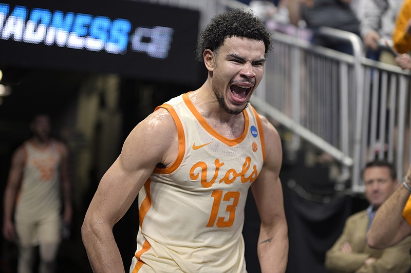 Tennessee forward Olivier Nkamhoua (13) celebrates after their win over Duke in a second-round college basketball game in the NCAA Tournament, Saturday, March 18, 2023, in Orlando, Fla. (AP Photo/Phelan M. Ebenhack)