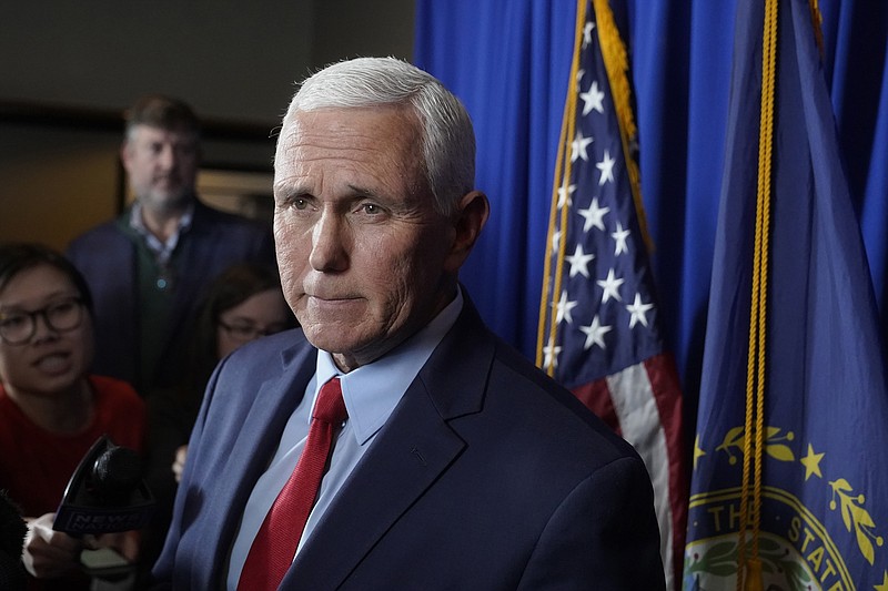 FILE - Former Vice President Mike Pence faces reporters after making remarks at a GOP fundraising dinner, March 16, 2023, in Keene, N.H. Top Republicans, including some of former President Donald Trump&#x2019;s potential rivals for the party&#x2019;s nomination, rushed to his defense on Saturday after Trump said he is bracing for possible arrest. &#x201c;Well, like many Americans, I&#x2019;m just, I&#x2019;m taken aback,&#x201d; said Pence, who is widely expected to launch a campaign in the coming weeks and has been escalating his criticism of Trump. (AP Photo/Steven Senne, File)