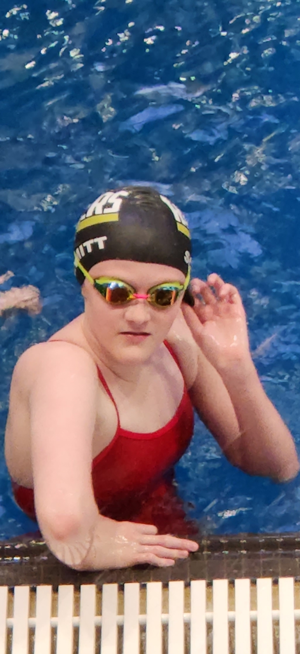 Schmitt wins three swimming titles - Vimarsana News