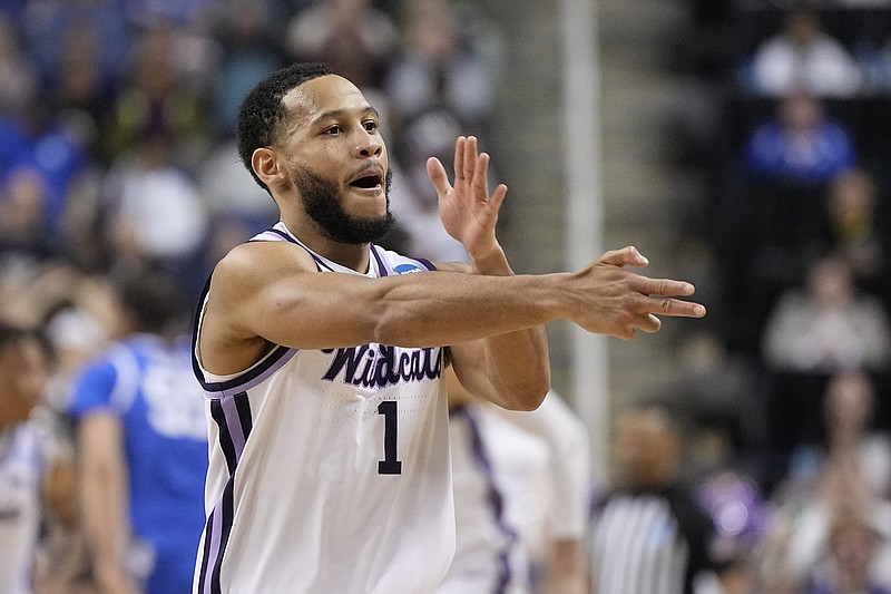 Kansas State guard Markquis Nowell celebrates after scoring against Kentucky during the second half of a second-round college basketball game in the NCAA Tournament on Sunday, March 19, 2023, in Greensboro, N.C. (AP Photo/Chris Carlson)