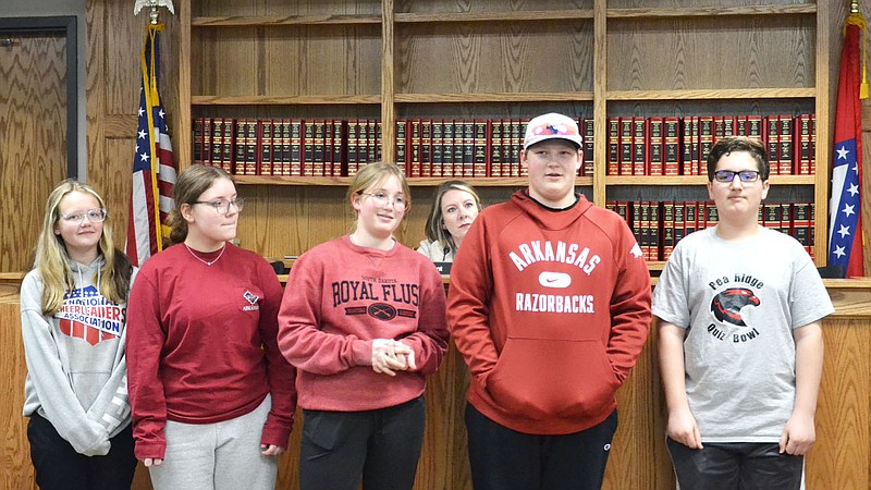Annette Beard/Pea Ridge TIMES
Some of the members of the Pea Ridge Jr. High School Quiz Bowl team were lauded at the School Board meeting for their success in winning the state championship.