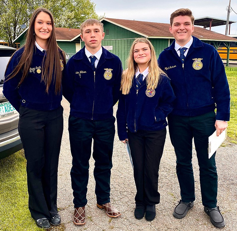 Submitted photo
The Decatur FFA livestock judging team placed first at the Northwest District Career Development Events on Thursday, March 16. The team advances to the state contest in April. Team members are Jacey Smith (left), Landen Watson, Emily Jackson and Wyatt Jackson.