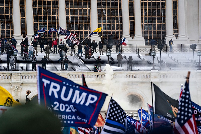 Supporters of Donald Trump clash with Capitol police during a riot at the U.S. Capitol on Jan. 6, 2021, in Washington, D.C. (Alex Edelman/AFP/Getty Images/TNS)