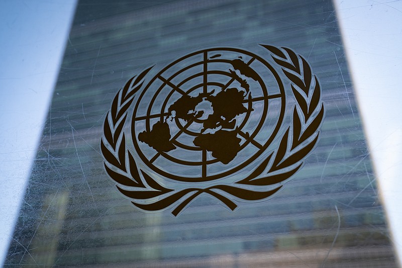 The symbol of the United Nations is displayed outside the Secretariat Building, Feb. 28, 2022, at United Nations Headquarters. On Saturday, the U.N.’s premiere global body fighting for gender equality called for wide-ranging efforts to close the gap between men and women in today’s technology-driven world and urged zero tolerance for gender-based violence and harassment online. (AP Photo/John Minchillo, File)