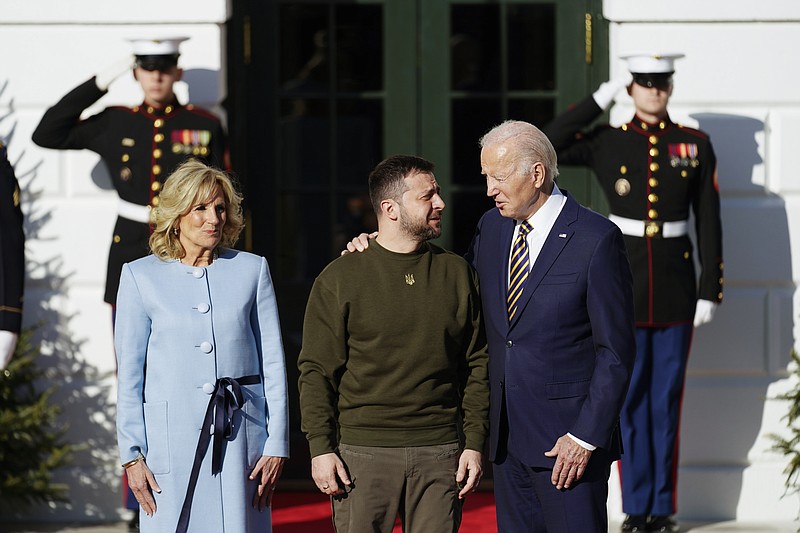 FILE - President Joe Biden welcomes Ukraine's President Volodymyr Zelenskyy at the White House in Washington, Wednesday, Dec. 21, 2022. A year ago, with Russian forces bearing down on Ukraine’s capital, Western leaders feared for the life of President Volodymyr Zelenskyy and the U.S. offered him an escape route. Zelenskyy declined, declaring his intent to stay and defend Ukraine’s independence.  (AP Photo/Andrew Harnik, File)