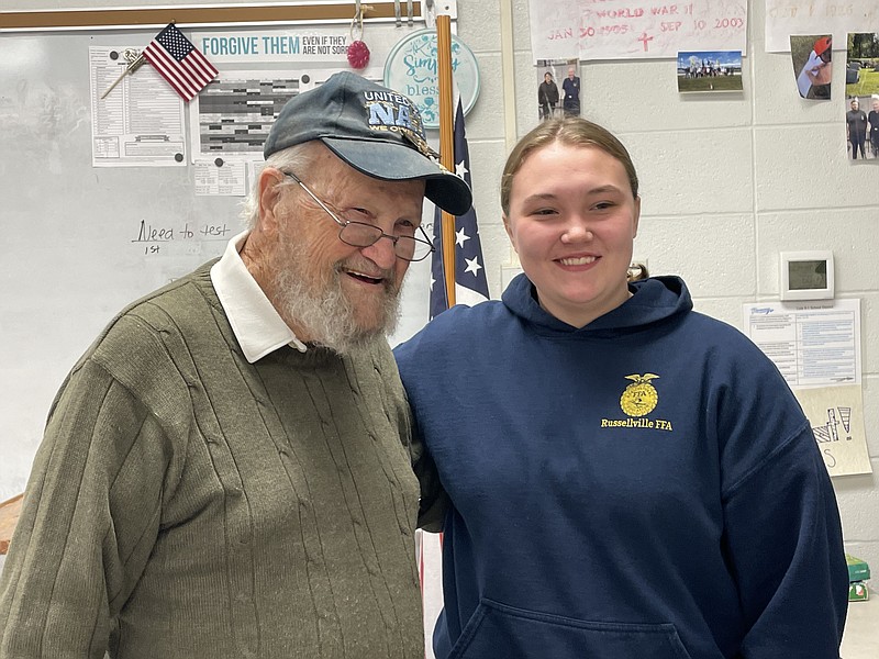 Democrat photo/Kaden Quinn
World War II veteran Don Lee visits with Russellville student and frequent correspondent Jillian Schmidt.