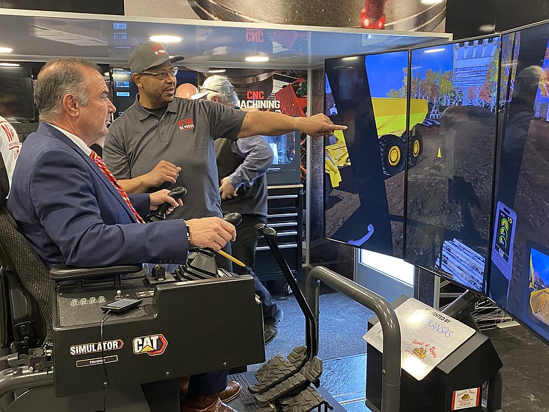 Anakin Bush/Fulton Sun photo: 
Missouri Lt. Gov. Mike Kehoe drives an excavator in a simulation at Be Pro Be Proud. The program began its tour of Callaway County high schools at North Callaway High School on Tuesday, March 21, 2023. Be Pro Be Proud will be at New Bloomfield High School on Wednesday, South Callaway High School on Thursday and Fulton High School on Friday.