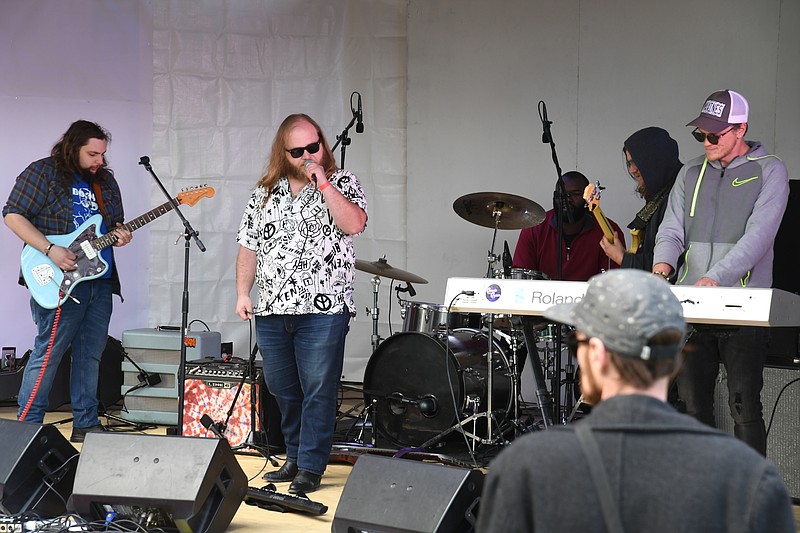 Local band Cosmic Cream kicks off Saturday's performances at the 19th annual Valley of the Vapors Independent Music Festival at Cedar Glades Park. - Photo by Lance Brownfield of The Sentinel-Record.