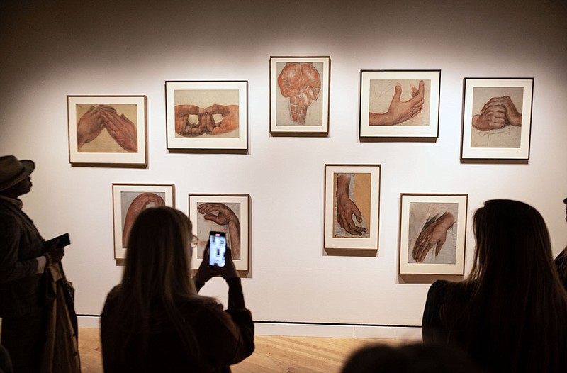 Visitors look a a studio of hands by the artist  Diego Rivera during an early viewing Thursday March 9, 2023 of the Diego Rivera’s America exhibit at Crystal Bridges Museum of American Art.
(NWA Democrat-Gazette/Spencer Tirey)