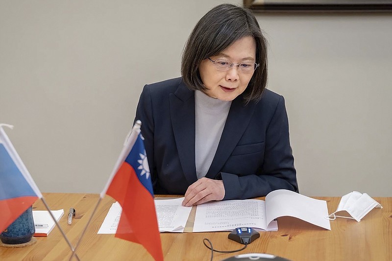 In this photo released by the Taiwan Presidential Office, Taiwan's President Tsai Ing-wen speaks by phone with the Czech Republic's President elect Petr Pavel in Taipei, Taiwan, Jan. 30, 2023. The Biden administration has been stressing to Beijing that an expected unofficial visit to the United States by Taiwan President Tsai Ing-wen should not be used as pretext by Beijing to step up aggressive activity in the Taiwan Strait.(Taiwan Presidential Office via AP)