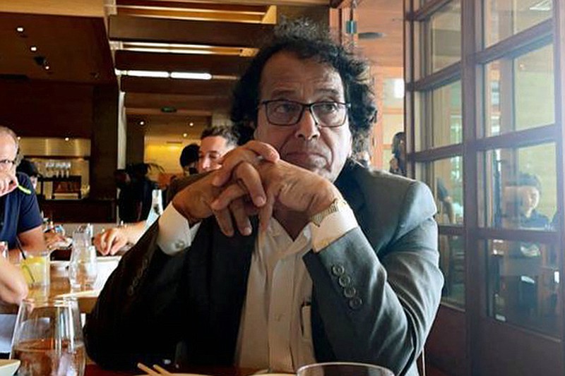 In this photo provided by Ibrahim Almadi, Saad Ibrahim Almadi sits in a restaurant in an unidentified place, in the United States, on August 2021. Saudi Arabia has freed the Saudi-American citizen it had imprisoned more than a year over his old tweets critical of the kingdom’s crown prince.  (Ibrahim Almadi via AP)