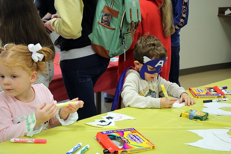 Photo By: Michael Hanich
Children drawing at the Camden Public Library during Superhero Story Time this past Tuesday, March 21st.