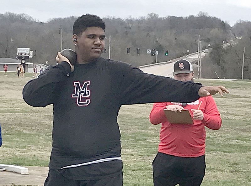 Bennett Horne/McDonald County Press
McDonald County freshman Jaylon Nepo prepares to take a throw in the shot put at the Mustang Stampede on Wednesday, March 22, at McDonald County High School in Anderson. The Mustangs' annual home meet was moved up one day from Thursday to Wednesday because of the threat of inclement weather on Thursday. Results of Wednesday's meet were not available at presstime.