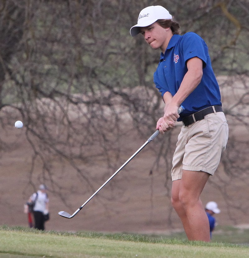 Will Boyd hits a chip shot on the ninth hole on Wednesday afternoon. Boyd won the the individual competition with a 34 (-2). (Democrat photo/Evan Holmes)