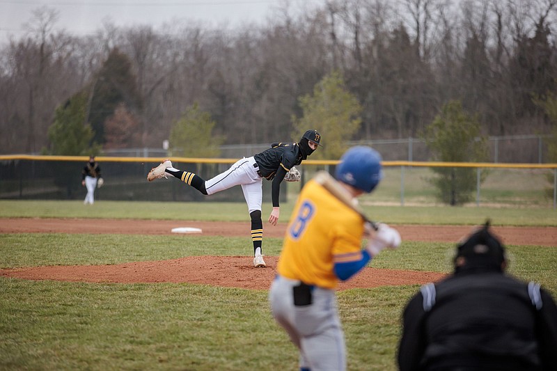 Fulton's Ethan Milius throws a pitch to Fatima's Blake Gentges Thursday at Darrell Davis Field in Fulton. In his first high school starting pitching appearance, Milius allowed one earned run in five innings; Gentges drove in the earned run. (Courtesy/Shawley Photography)