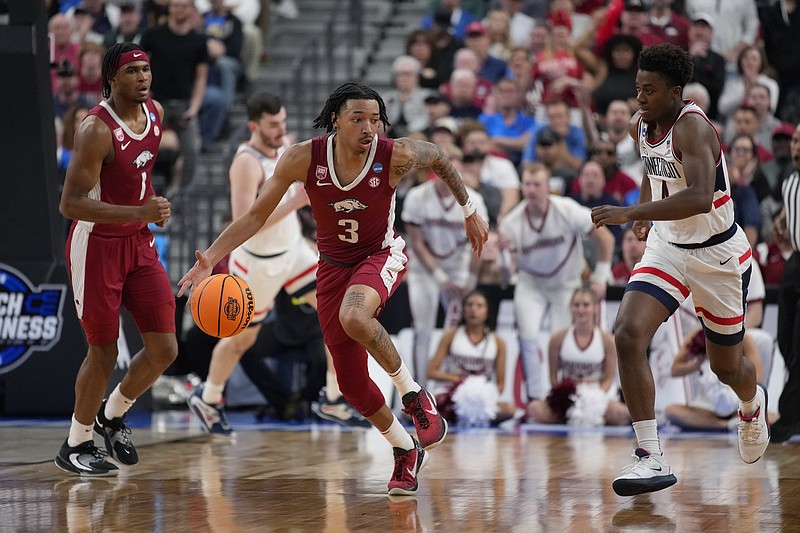Arkansas' Nick Smith Jr. (3) dribbles down the court against UConn in the first half of a Sweet 16 game in the West Regional of the NCAA Tournament Thursday in Las Vegas. - Photo by John Locher of The Associated Press
