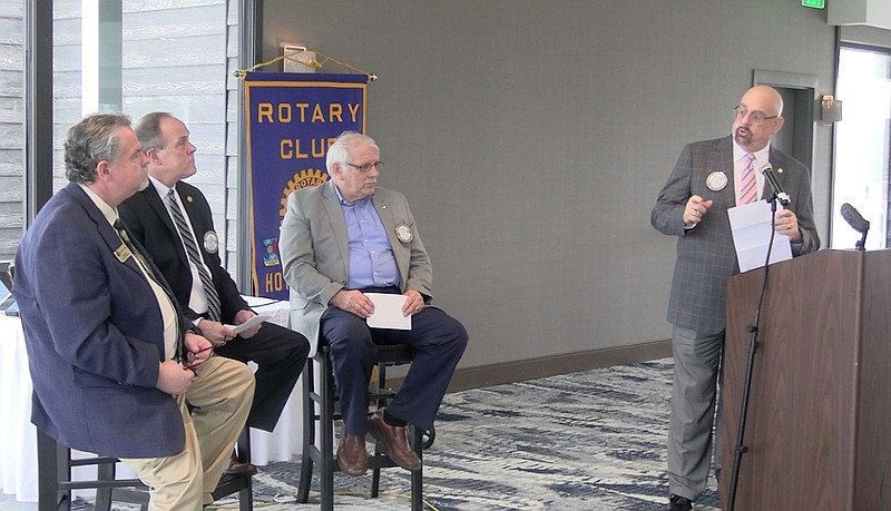 From left, state Sen. Alan Clark and state Reps. Les Warren and Richard McGrew are asked a question by Rotary Club President Neal Gladner. – Photo by Courtney Edwards of The Sentinel-Record