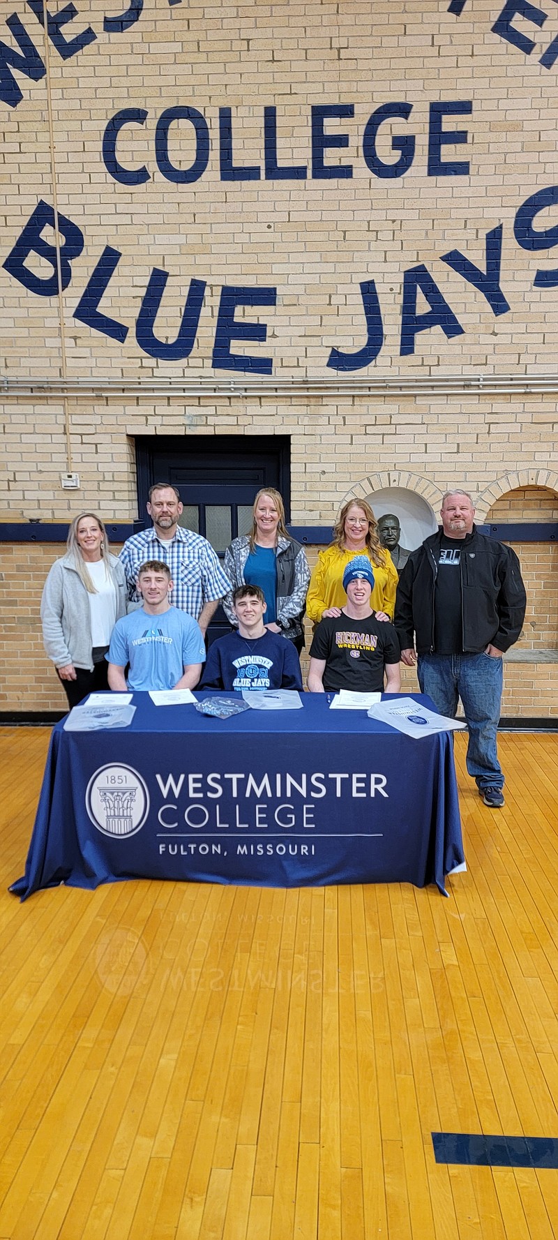 Westminster College men's wrestling signed Austen Wetzel (Battle), Cole Harrell (Hickman) and Aidyn Merchant (Macks Creek) Friday at the Historical Gym in Fulton.