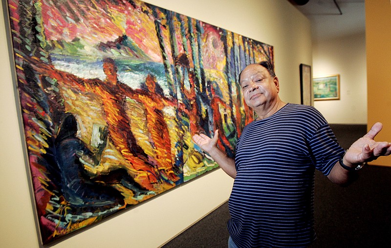 Cheech Marin poses with "Early Hawaiians, 1983," by Carlos Almaraz on June 13, 2008, in Los Angeles. 
(File Photo/AP/Reed Saxon)