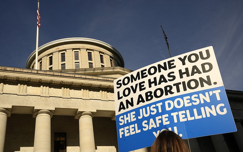 Protesters rally at the Ohio Statehouse in support of abortion after the Supreme Court overturned Roe vs. Wade, June 24, 2022, in Columbus, Ohio. The Ohio Supreme Court agreed Tuesday, March 14, 2023, to review a county judge’s order that is blocking enforcement of the state's near-ban on abortions, and to consider whether the clinics challenging the law have legal standing to do so. In its split decision, the court, however, denied Republican Attorney General Dave Yost's request to launch its own review of the right to an abortion under the Ohio Constitution, leaving those arguments to play out in lower court. (Barbara J. Perenic/The Columbus Dispatch via AP, File0