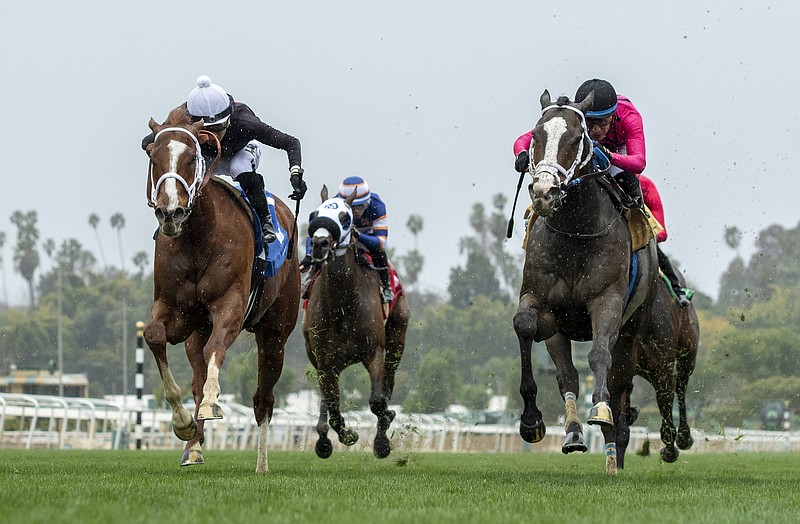The Chosen Vron and jockey Hector I. Berrios, left, battle Indian Peak, with Juan Hernadez, as The Chosen Vron goes on to win the $100,000 Sensational Star Stakes March 19 at Santa Anita in Arcadia, Calif. - Photo by Benoit Photo via The Associated Press