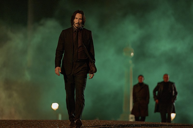 This image released by Lionsgate shows Keanu Reeves as John Wick in a scene from &quot;John Wick 4.&quot; (Murray Close/Lionsgate via AP)