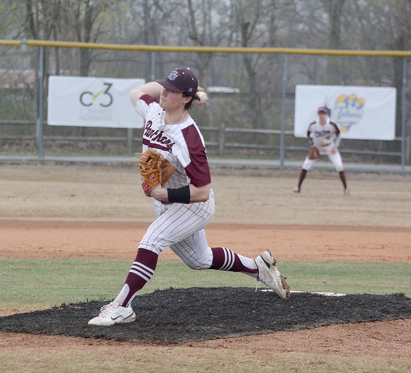 Graham Thomas/Herald-Leader
Siloam Springs senior Andrew Pilcher throws a pitch against Heber Springs on Thursday, March 23, in the Panther Classic.