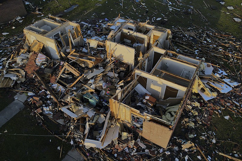 Damage to a house is seen Monday, March 27, 2023, in Rolling Fork, Miss., three days after a tornado ripped through the town. (AP Photo/Julio Cortez)