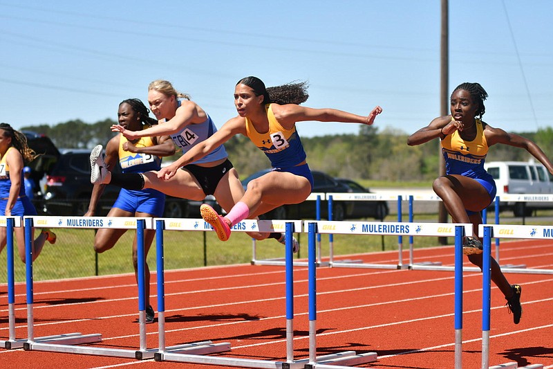Southern Arkansas University's Kaliyah Thompson, who graduated from Liberty-Eylau, won the 100-meter hurdles in a career-best time of 14.88 during the Dan Veach Invitational on Saturday, March 25, 2023, in Magnolia, Arkansas. (Photo by Kevin Sutton/TXKSports.com)