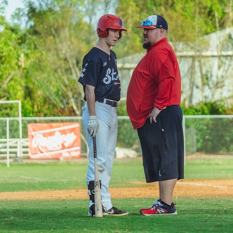 Brenton Clark and Chase Brewster, both of Texarkana, talk during the Perfect Game MLK Tournament held recently in Fort Myers, Florida. (Submitted photo)