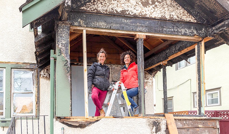 Emergency restoration experts and sisters Kirsten and Lindsey survey the fire damaged porch at this Minneapolis house owned by the Williams as seen on “Renovation 911.” The sisters were introduced to the business of emergency renovations by their father, who makes an appearance in the series. (Stephanie Rau/HGTV/Discovery/TNS)