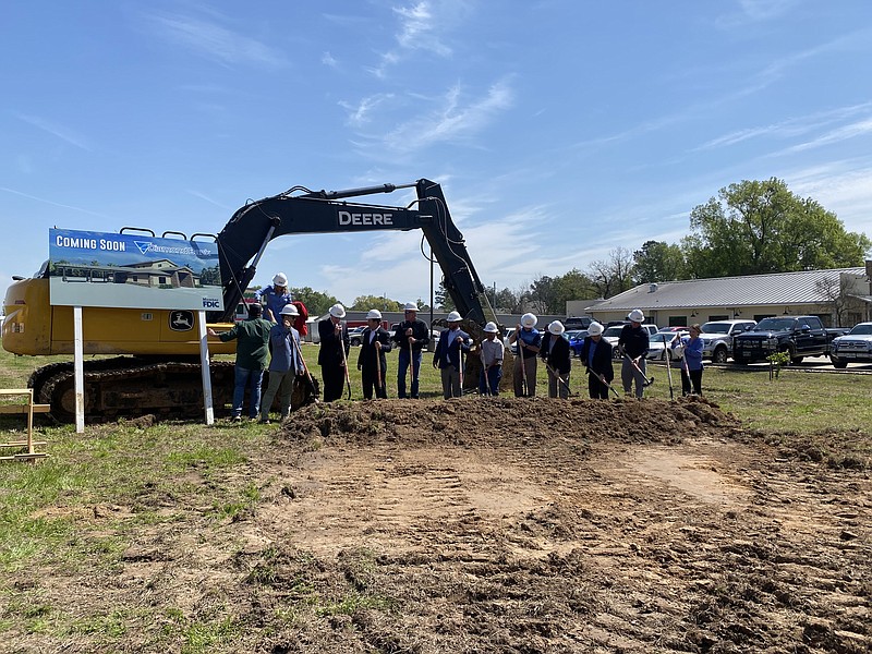 Branch associates and members of Diamond Bank’s leadership team break ground for the bank’s new location Tuesday, March 28, 2023, at 5712 Richmond Road next to Big Jakes BBQ in Texarkana, Texas. (Staff photo by Sharda James)