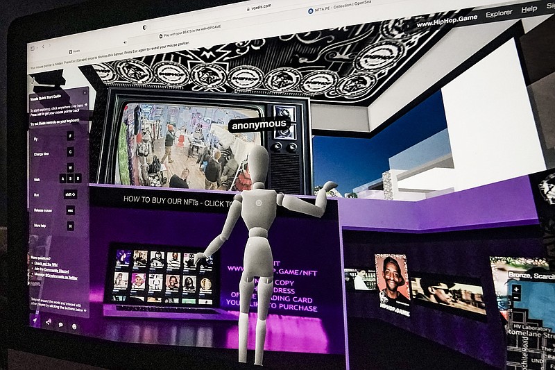 A computer shows the interactive feed Jan. 27 from a popup livestream event for "Hiphop.Game," a metaverse platform created by crypto investor Tyrone Norris to market NFTs and its related cryptocurrency "@Joincoin," at Love Gallery in Brooklyn, N.Y. (AP/Bebeto Matthews)