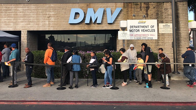 Lines stretches outside at the downtown Los Angeles DMV field office. (Christopher Reynolds/Los Angeles Times/TNS)
