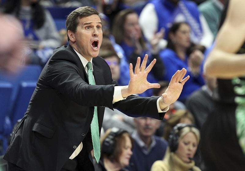 FILE - Utah Valley head coach Mark Madsen directs his team during the first half of an NCAA college basketball game against Kentucky in Lexington, Ky., Monday, Nov. 18, 2019. California is hiring a former Stanford star to revive its struggling basketball program. The Golden Bears have agreed to a contract with Mark Madsen to replace the fired Mark Fox following the worst season in school history.(AP Photo/James Crisp, File)