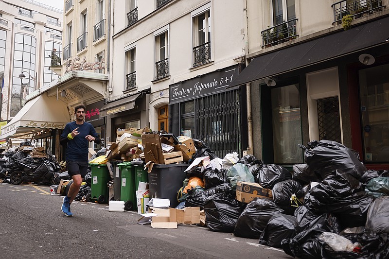 Long Paris trash strike ends, workers face daunting cleanup