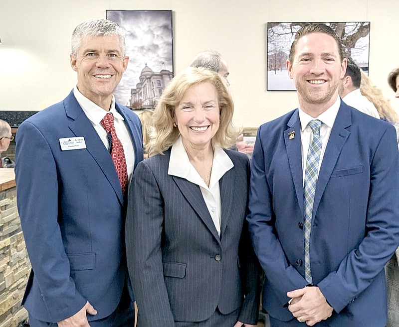 Photo submitted Siloam Springs Chamber President and CEO Arthur Hulbert (left), poses with State Representative Delia Haak (R-17) and State Senator Tyler Dees (R-35) at a meeting of the Western Benton County Partnership. The WBCP was formed to bring growth to the Highway 59 corridor, Haak said.