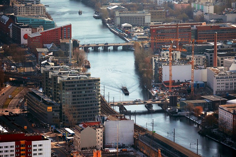 Construction sites and commercial property along the River Spree in the Mitte and Kreuzberg districts in Berlin, Germany on Thursday, Feb. 9, 2023. Chancellor Olaf Scholz's Social Democrats crashed to their worst-ever result in Berlin, failing to win an election in the German capital for the first time since 1999 as the conservative Christian Democrats surged to victory. MUST CREDIT: Bloomberg photo by Krisztian Bocsi