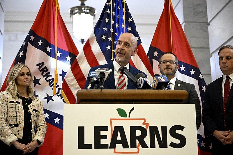 Arkansas Education Secretary Jacob Oliva talks to the media during a signing ceremony for the Arkansas LEARNS Act in the second floor rotunda of the state Capitol in Little Rock on Wednesday, March 8, 2023. (Arkansas Democrat-Gazette/Stephen Swofford)