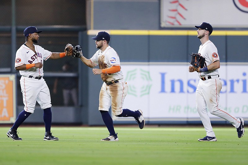 Yordan Alvarez signs home run baseball for fan who caught it