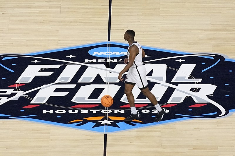 San Diego State guard Lamont Butler drives up court against Florida Atlantic during the first half of a Final Four college basketball game in the NCAA Tournament on Saturday, April 1, 2023, in Houston. (AP Photo/Godofredo A. Vasquez)