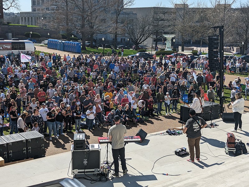 Ryan Pivoney/News Tribune photo: 
Christian singer Sean Feucht performs live Sunday afternoon, April 2, 2023, to a crowd gathered outside the Missouri Capitol in Jefferson City. The concert was the third in Feucht's national “Kingdom to the Capitol” tour that will visit all 50 state capitol buildings.