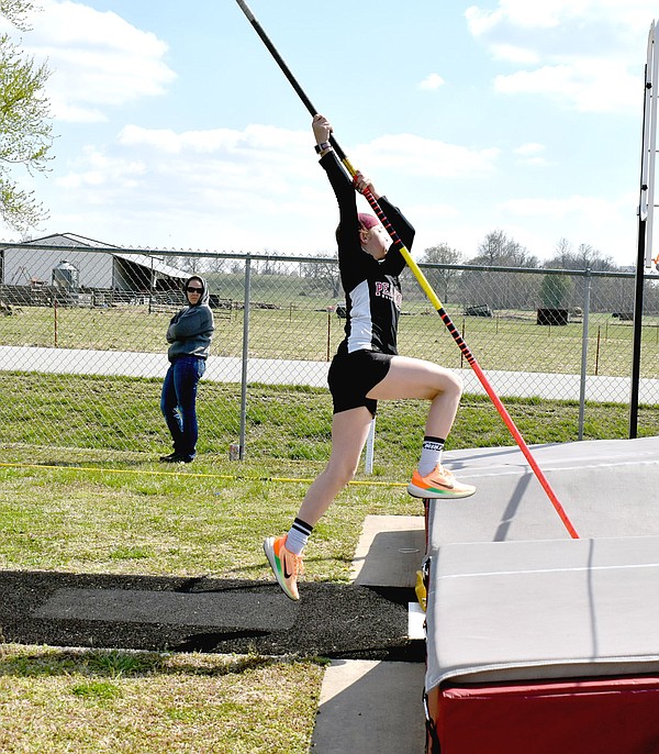 Pole vaulters reach heights