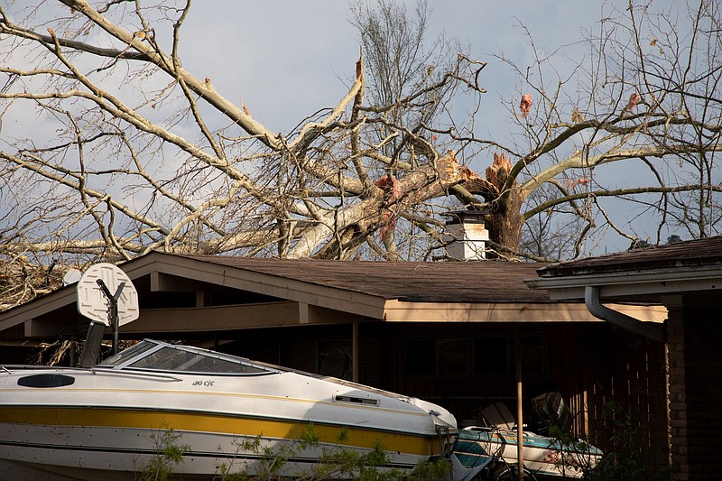 The March 31 tornadoes caused devastation in central and eastern Arkansas as shown in this photo where boats and a home were apparently damaged. (Special to The Commercial/University of Arkansas System Division of Agriculture)