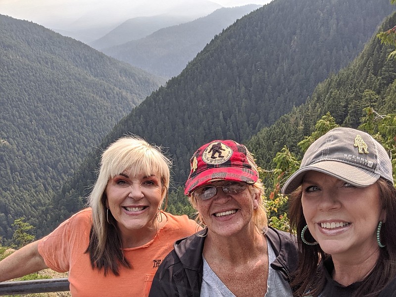 Sisters of the Moon Sandi Harris (left), Barbara Locke and Debi Jones enjoy traveling to scenic woodlands, including this spot in northwestern California, to research Bigfoot. (Special to the Democrat-Gazette/Debi Jones)