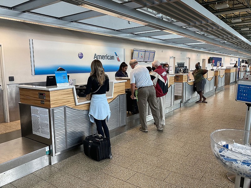 Passengers check in Aug. 17 at Northwest Arkansas National Airport.
(File Photo/NWA Democrat-Gazette/Flip Putthoff)