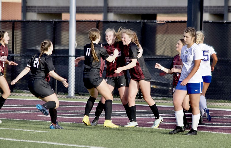 Mark Ross/Special to Herald-Leader
Siloam Springs girls soccer players celebrate after Ellen Slater's goal to give the Lady Panthers a 3-2 lead against Harrison on Thursday, April 6, at Panther Stadium.