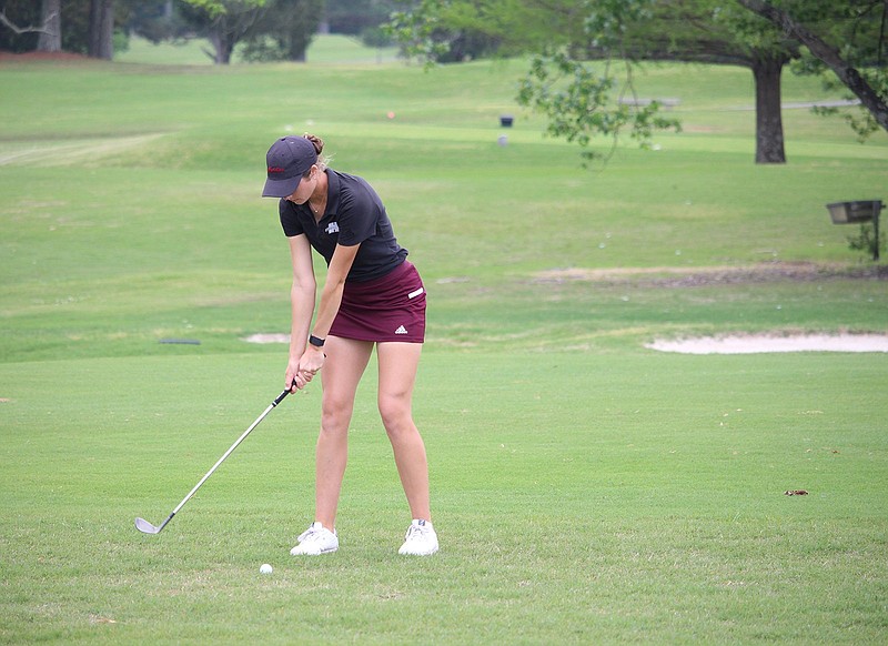 Henderson State's Gracen Blount lines up her shot at Hot Springs Country Club on May 4, 2022. - Photo by Krishnan Collins of The Sentinel-Record