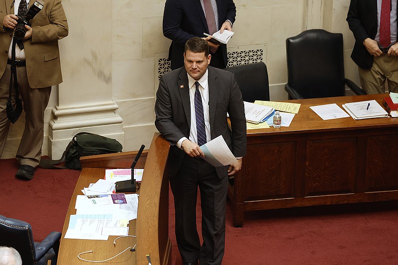 Sen. Bart Hester, R-Cave Springs, walks to the well to introduce a resolution that would extend the General Assembly session through April 7, during the Senate session on Monday, Feb. 13, 2023, at the state Capitol in Little Rock. 
(Arkansas Democrat-Gazette/Thomas Metthe)