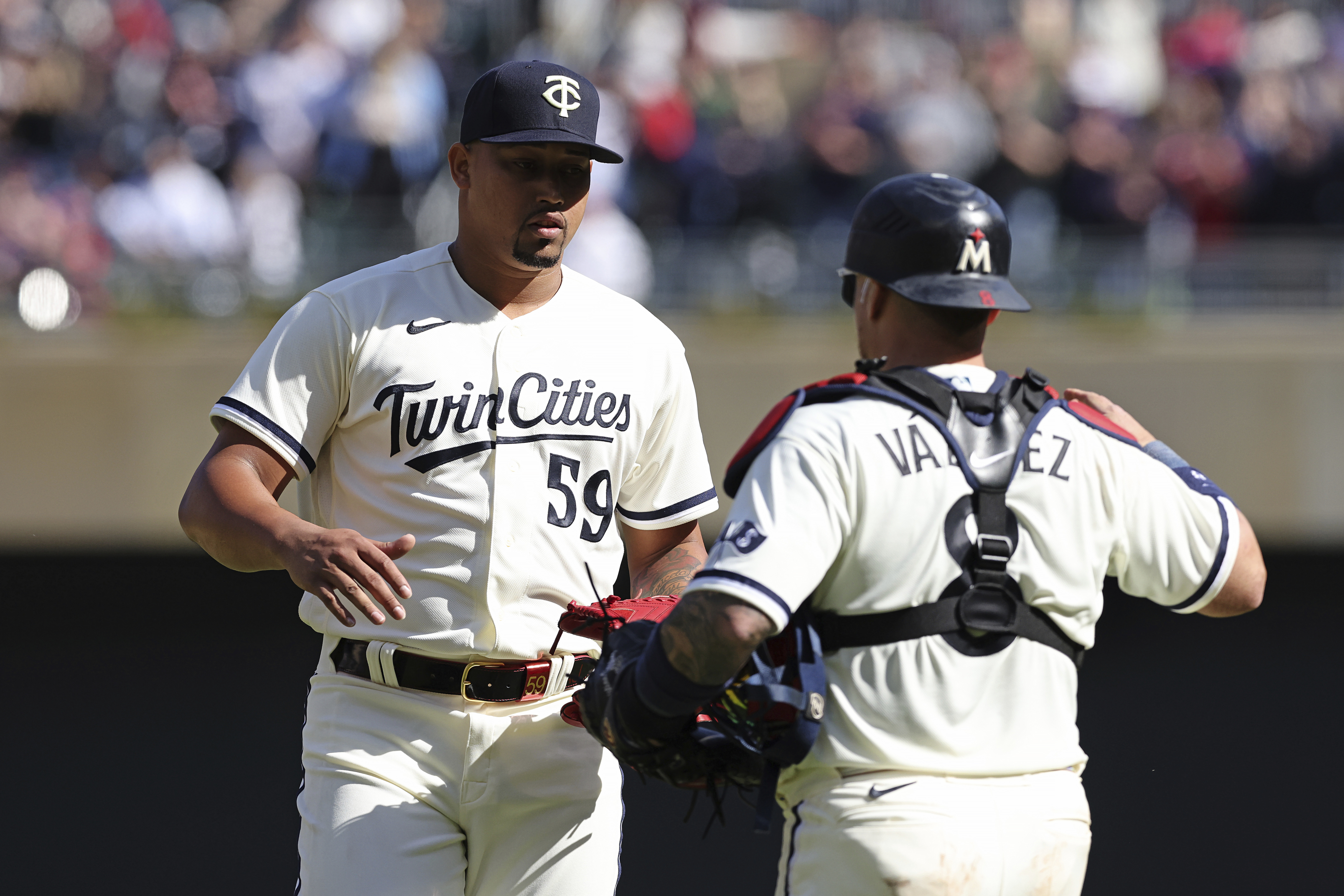 Minnesota Twins relief pitcher Jhoan Duran takes the field to